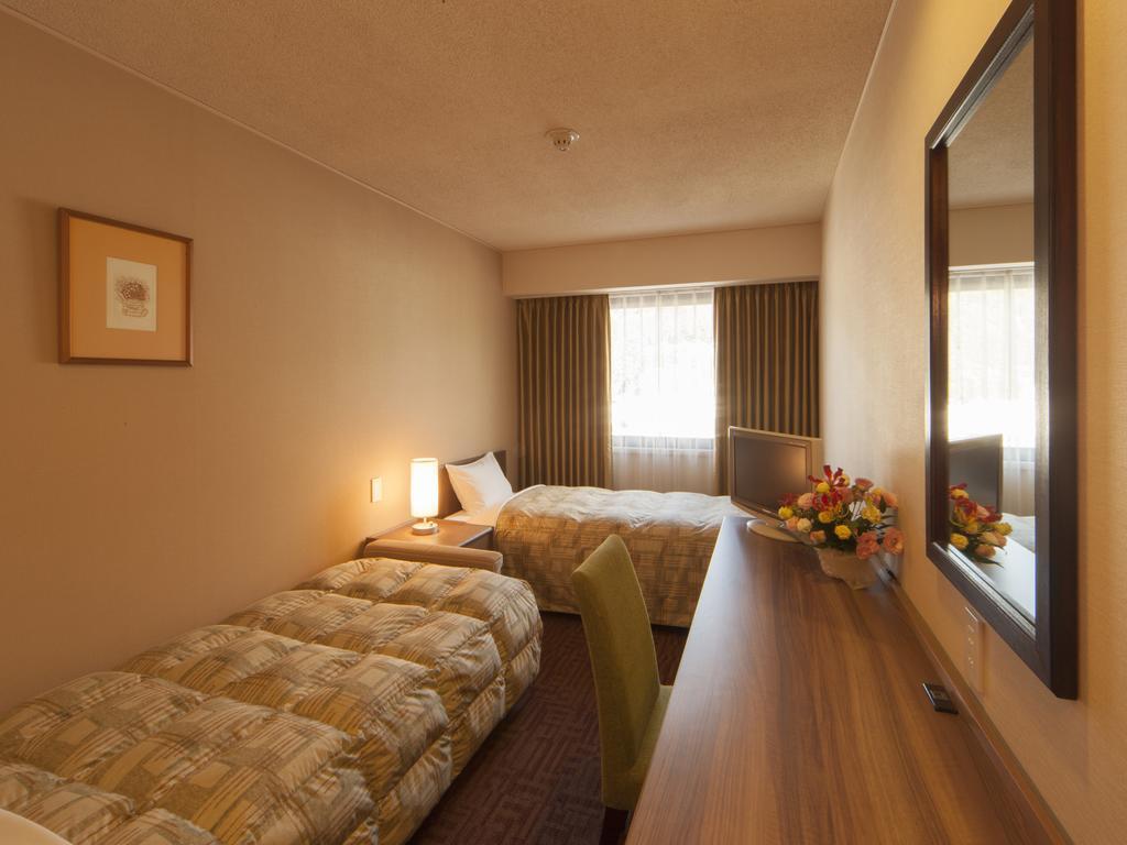 Hotel Pearl City Kesennuma Номер фото